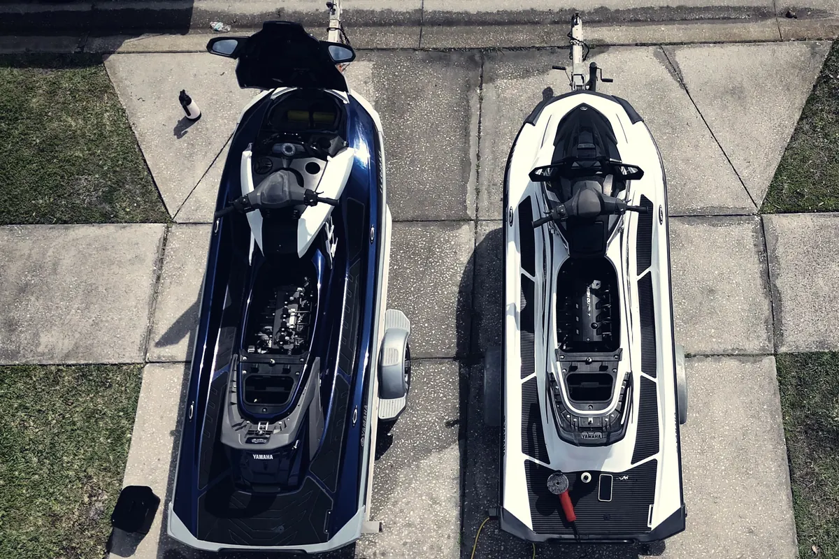 Two Yamaha WaveRunners on their trailers, seen from directly above during a detail